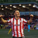 Derry City goalscorer Danny Mullen celebrates his second half strike in front of the North Stand. Photograph by Kevin Moore.