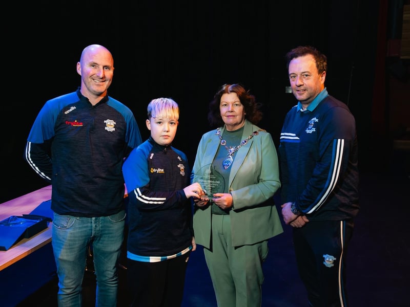 Derry City & Strabane District Council Mayor Patricia Logue making a presentation to 2010 coaches John Roulston, Martin McDaid and captain MJ Doherty, whose side won the Winter Cup. Photo: Karol McGonigle, Milkwood Studios.