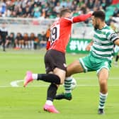 Derry City winger Ryan Graydon is caught by Shamrock Rovers defender Roperto Lopes in the first half at Tallaght. Photographs by Kevin Moore.