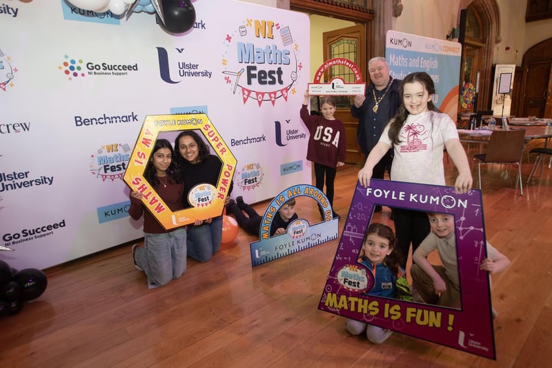 Deputy Mayor Darren Guy pictured with some of the young people who attended Saturday's NI Maths Fest event in the Guildhall. (Photo: Jim McCafferty Photography) : .