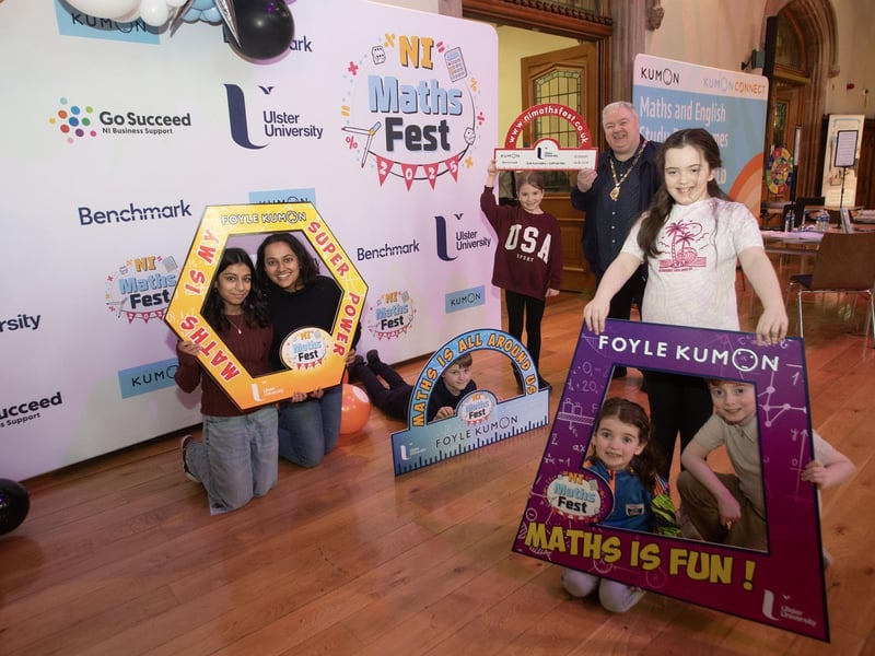 Deputy Mayor Darren Guy pictured with some of the young people who attended Saturday's NI Maths Fest event in the Guildhall. (Photo: Jim McCafferty Photography) : .