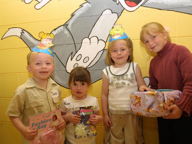 Jack McConnellogue, Niamh Carlin, Dearbhaile Duff and Zoe Mc Connellogue exchanging presents at the Fun Factory