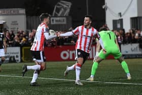 Colm Whelan races back to the halfway line with the ball after Derry's equaliser against Sligo. Photo by George Sweeney.