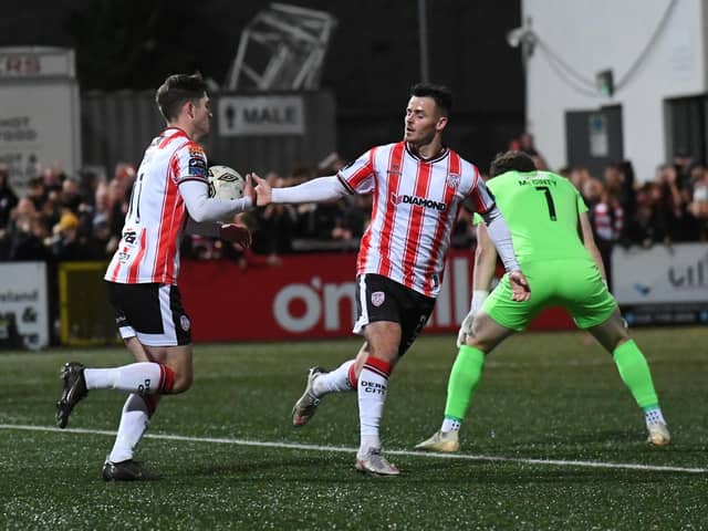 Colm Whelan races back to the halfway line with the ball after Derry's equaliser against Sligo. Photo by George Sweeney.