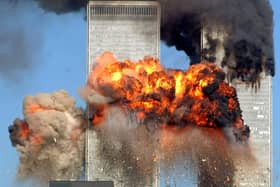 NEW YORK - SEPTEMBER 11:  Hijacked United Airlines Flight 175 from Boston crashes into the south tower of the World Trade Center and explodes at 9:03 a.m. on September 11, 2001 in New York City.  The crash of two airliners hijacked by terrorists loyal to al Qaeda leader Osama bin Laden and subsequent collapse of the twin towers killed some 2,800 people. (Photo by Spencer Platt/Getty Images)