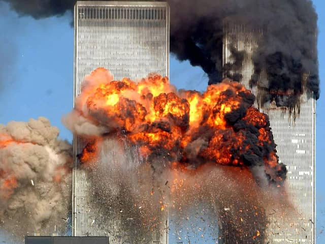 NEW YORK - SEPTEMBER 11:  Hijacked United Airlines Flight 175 from Boston crashes into the south tower of the World Trade Center and explodes at 9:03 a.m. on September 11, 2001 in New York City.  The crash of two airliners hijacked by terrorists loyal to al Qaeda leader Osama bin Laden and subsequent collapse of the twin towers killed some 2,800 people. (Photo by Spencer Platt/Getty Images)