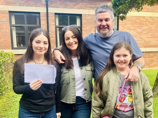 Marli Cunningham shares her GCSE outcomes with her parents and sister.
