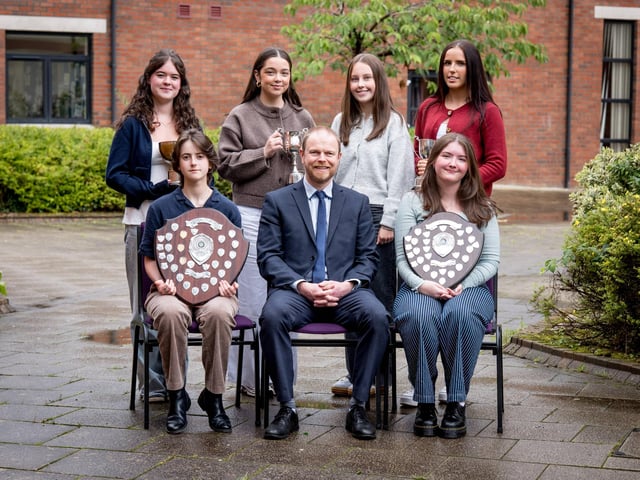 Top Performing Students in Each Subject. Front Row: Robyn Foy, Dr N. Morewood (Head of Year 14), Sara Lindsay. Back Row: Katharine Hickey, Elie Halpin, Beth Ward, Ella Wade