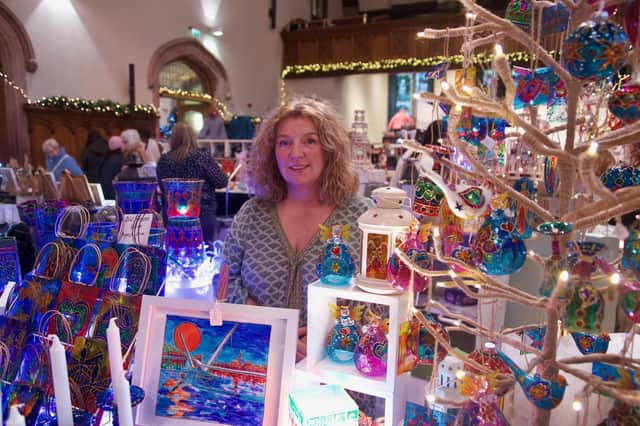 Ashling Ramsey, owner of Willow Studios, with her hand painted glass.