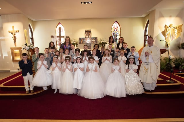 Children from St. Paul's Primary School who received the Sacrament of First Holy Communion from Fr. Sean O'Donnell at St. Joseph's Church, Galliagh. (Photo: Jim McCafferty Photography)