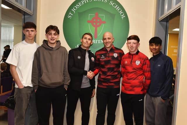 Young players from the Derry City Scholarship Programme pictured with Danny Harrison, Steven Gerard Academy and Mark McChrystal, Technical Director Derry City FC,at the programme’s launch in St Joseph’s Boy's School. Photo: George Sweeney