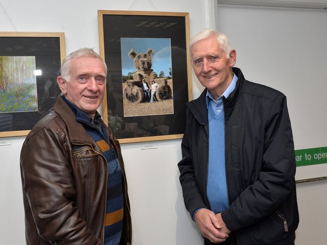 Amateur photographers Tony Kelly and Terry Harkin pictured bedside Tony’s exhibit at the recent Eden Place Arts Centre Student Christmas Exhibition. DER4718GS024