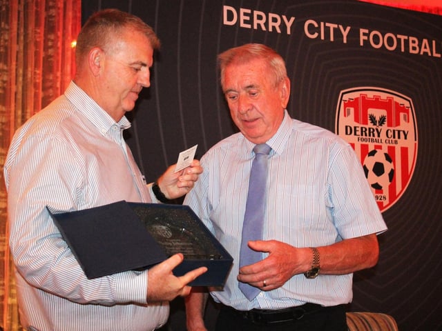 Commercial Manager, Robert Martin presents legendary kitman Philip Johnston with a special recognition award.