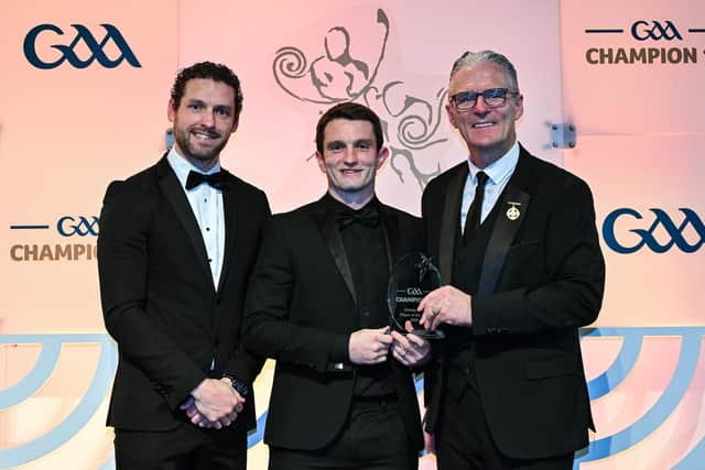 Derry captain Cormac O’Doherty is presented with his Christy Ring Cup Player of the Year award by Uachtarán Chumann Lúthchleas Gael Jarlath Burns, right, and GPA Chief Executive Officer Tom Parsons during the GAA Champion 15 Awards 2026 ceremony at Croke Park in Dublin. Photo by Sam Barnes/Sportsfile