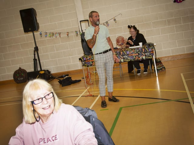 Mickey Doherty and Jean McCauley get the OLT/CNP Community Bingo started on Wednesday night.