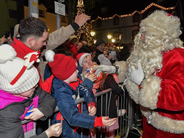 Santa arrived in Buncrana on Friday evening to meet the children and toswitch on the Christmas tree lights switch in Market Square. Photo: George Sweeney