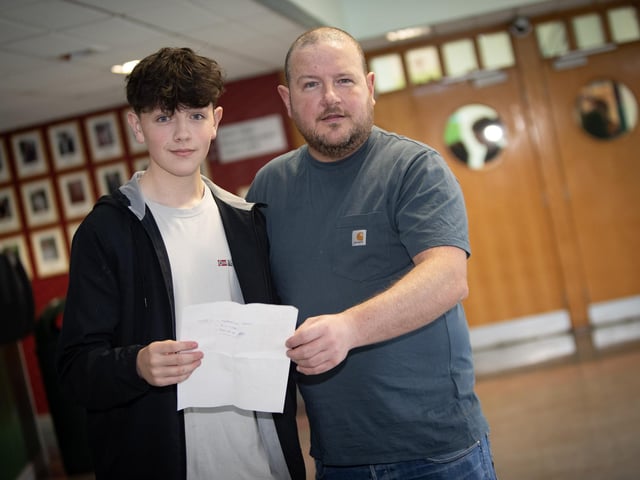 BOY DID WELL!. . . .Brendan McSwiney and his dad Terence pictured at St. Joseph's Boys School on Thursday.