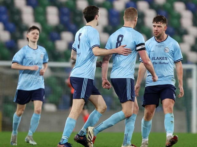Enniskillen Town United goalscorers Cathal Beacom (8) is congratulated during Friday's fonaCAB Craig Stanfield Irish Junior Cup final at Windsor Park. (Photo: IFA)