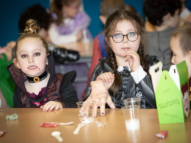 Two of the more colourful younger students pictured in the school canteen on Friday. : .