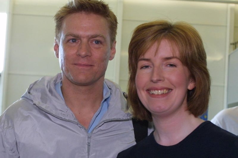 Mary Callaghan of Kilfennan pictured with Rock star Bryan Adams when he arrived in Derry yesterday afternoon.(2408Jb10)