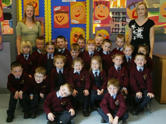 P1 pupils from St. Eithne's Ps with classroom assistnat Allison Doherty and class teacher Diana Coyle.  (0310JB23):20 years on: Young people across Derry and Donegal starting school in September 2003
