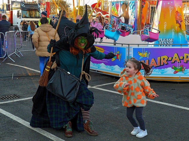 Young Eabha Molloy dancing with Winifred the Witch at Cullen's Halloween Funfair in Ebrington Square. Photo: George Sweeney.  DER2243GS – 063