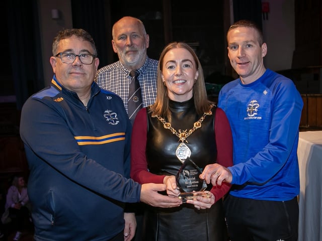 Xavier Prigeny and Ryan Horner, joint winners of the Recognition Award, receiving their trophy from the Mayor, Grace Ui Niallais at the Annual Derry City and Strabane District Sports Awards 2026 in the Guildhall on Thursday night. Back centre is Bill Anderson, Chair, Sports Council,. (Photos: Jim McCafferty Photography)