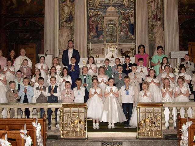 Pupils from Long Tower Primary School who received the Sacrament of First Holy Communion from Fr. Gerard Mongan at St. Columba's Church, Long Tower on Friday last. (Photo: Gerry Temple)