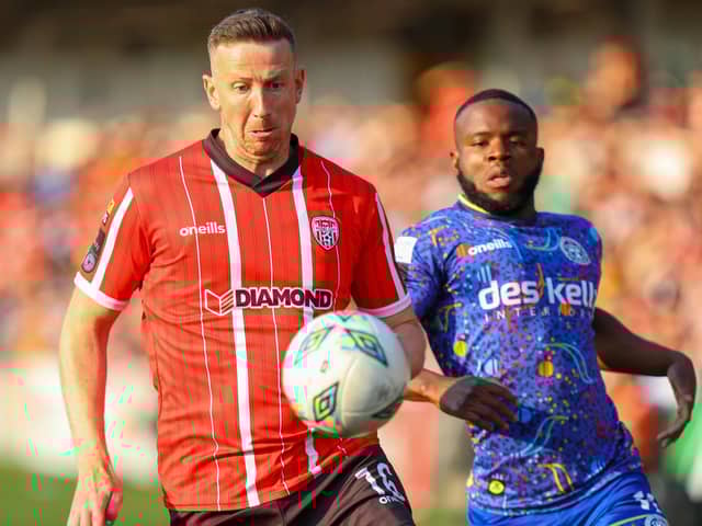 Derry City defender Shane McEleney pictured with Bohemians striker James Akintunde. Photo by Kevin Moore.