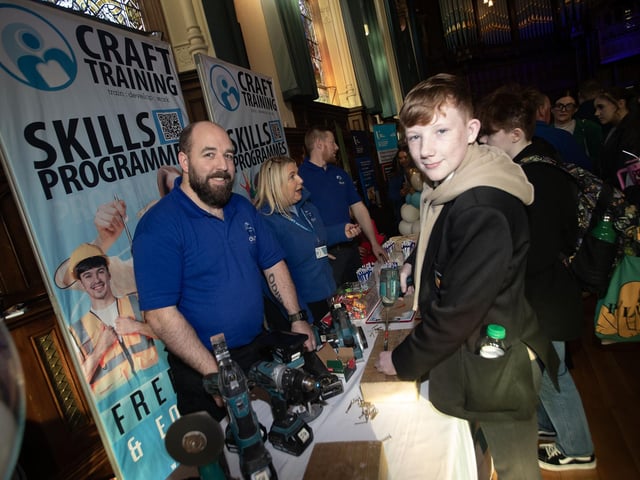 Student Joseph Harkin pictured chatting to Craft Training's Evan Johnston during Thursday's event in the Guildhall, Derry.