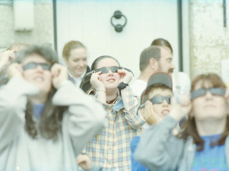 People view the total eclipse of the sun from Greencastle.