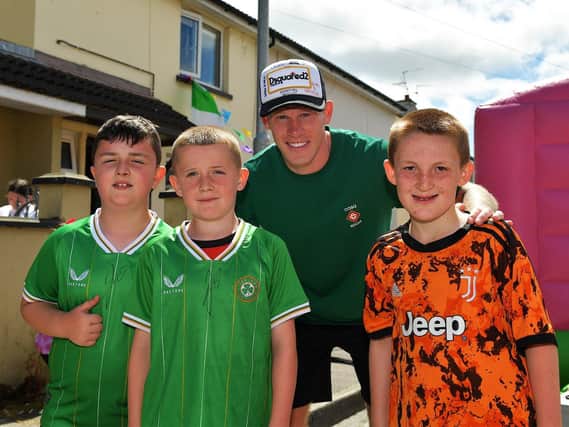 Young fans pictured with James McClean during a street party held in Creggan Heights, on Saturday afternoon, to celebrate James winning his 100th international cap for the Republic of Ireland. Photo: George Sweeney. DER2325GS - 103
