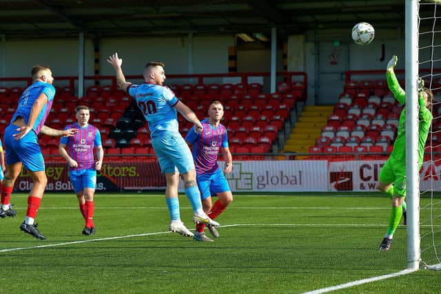 Institute’s Cathair Friel heads home a first half goal Ards, on Saturday.   Picture by George Sweeney.  DER2241GS – 72