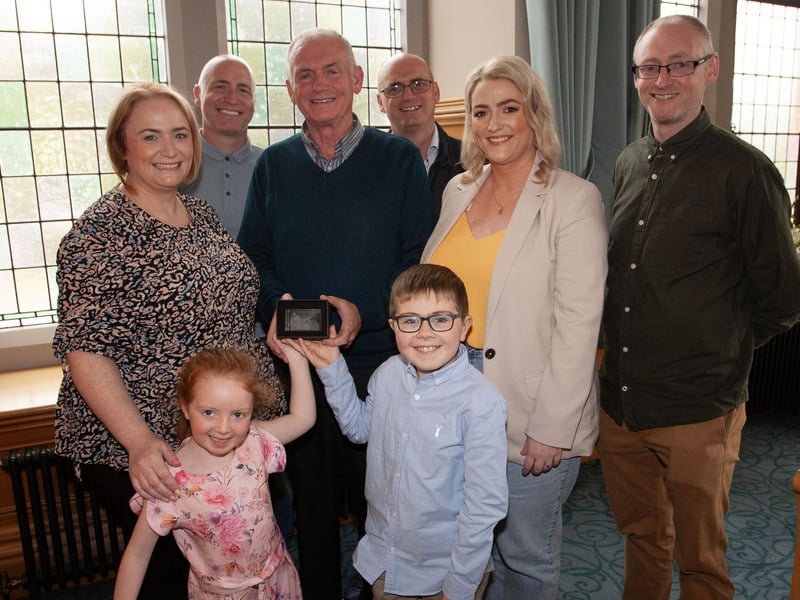 Retired bus driver Trevor Tracey pictured with his family at the Guildhall on Thursday evening.