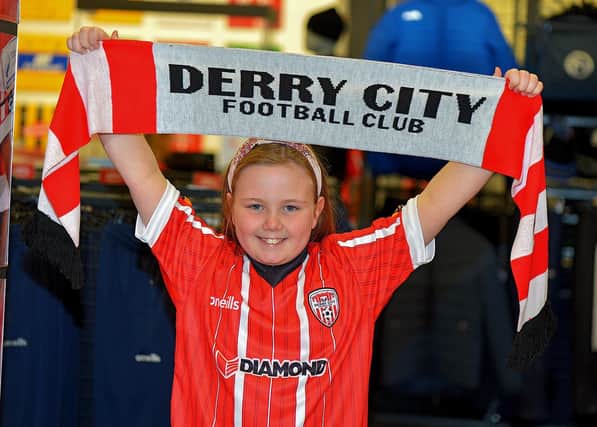 Rebecca Lynch, aged 9, records a good luck video message for the Derry City team, at O’Neill’s Sports store, ahead of their Extra.ie FAI Cup final against Shelbourne, which takes place at the Aviva Stadium, on Sunday, November 13th. DER2244GS – 104
