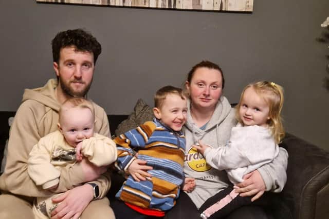 Chloe Rutherford, Darian Moore with their three children.