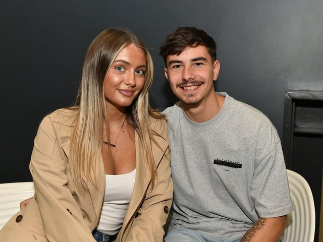 Riley Hume with Ballymena United footballer Daithí McCallion at the opening night of the Grove Theatre Group's production of Annie at the Millennium Forum on Wednesday. Photo: George Sweeney