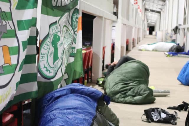 Celtic fans taking part in the 'Sleep Out' in Celtic Park in Derry