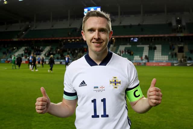 Shane Ferguson at the end of the game against Estonia where he scored the winner on his 50th caP at the A Le Coq Arena in Tallinn.