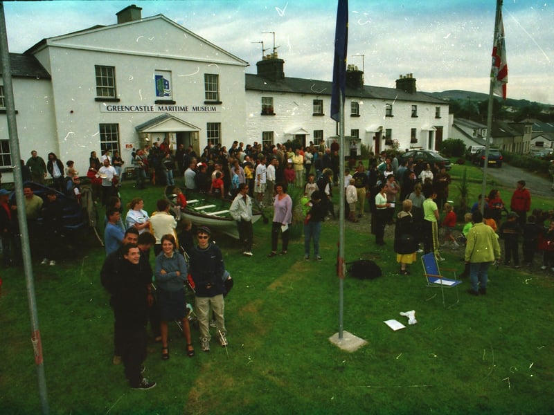 People gather at Greencastle Maritime Museum to view the total eclipse of the sun.