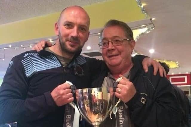 Joe McLaughlin with his son Paddy, then Cliftonville boss, after the North Belfast team's epic 4-3 victory over Coleraine in the 2022 League Cup final.