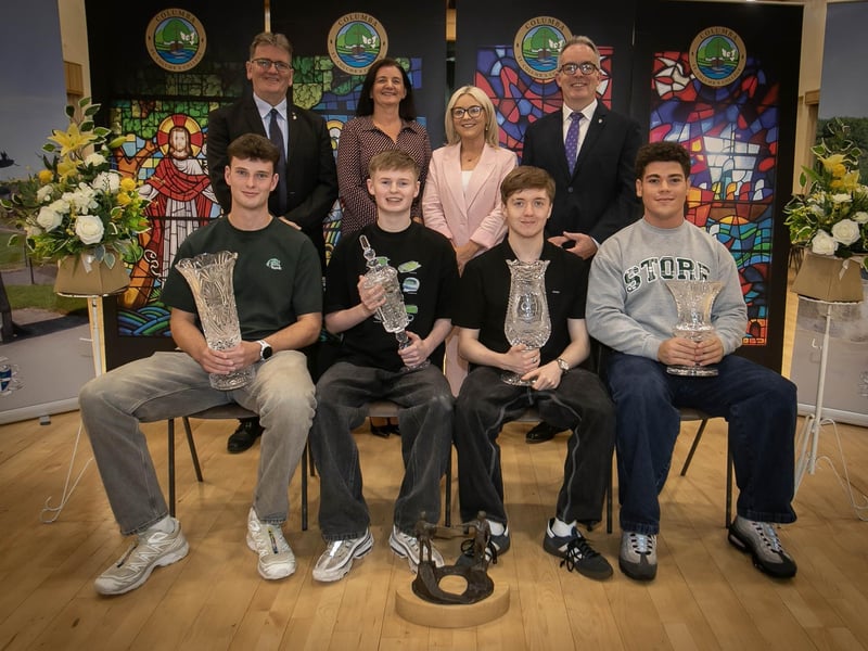 The BTEC National Extended Certificate in Business Prize / The BTEC National Diploma in Business Prize/ Cambridge Technical Introductory Diploma in IT Prize and the National Extended Diploma in Sports Coaching Prize award winners - Matthew James, Conal McLaughlin, Luca Duffy and Logan Davis-Moran pictured at Thursday's prizegiving. At back from left are Mr Donal Chambers (Head of Year 14), Mrs Sinéad McGonigle (Teacher Governor), Mrs Leanne Toner (Head of ICT / Digital technology) and Mr Tony McGonigle (Senior Teacher). : .