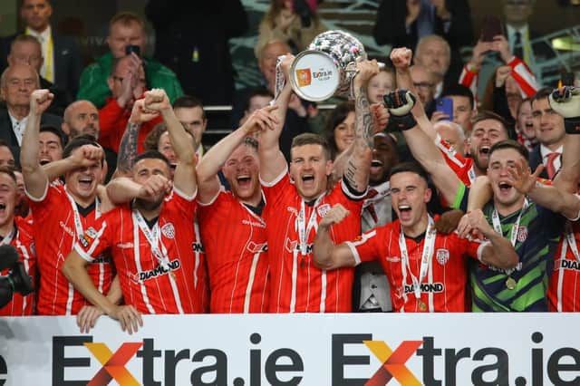 YESSSS! Derry City captain Patrick McEleney lifts the Extra.ie FAI Cup after the Candystripes superb 4-0 victory over Shelbourne in the Aviva Stadium on Sunday. (Photo: Kevin Moore/MCI)