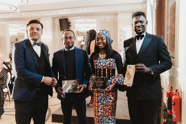 Left, Chaudhary Hamza Riaz, presenting this year’s Young Leader prizes to winner Daniel Sanusi and runners-up Frank Nwanonenyi and Inioluwa Olaosebikan.
