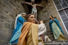 The statue of St ColmCille at St Columba's Church, Long Tower.