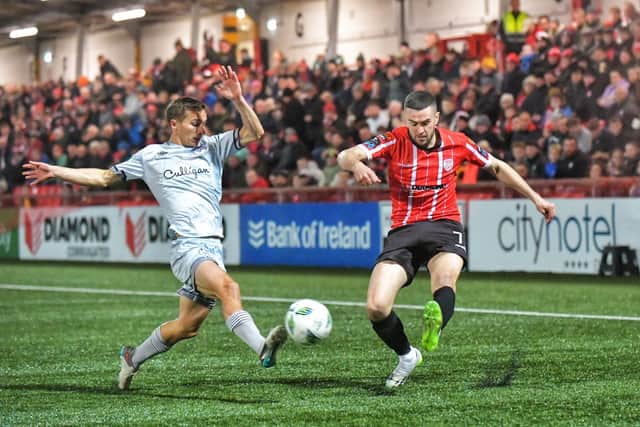 MIchael Duffy swings in a cross during the stalemate with Shelbourne at Brandywell. Photo by George Sweeney.
