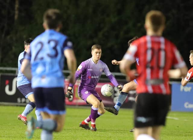 Derry City keeper 's Brian Maher produced a stunning save against UCD when Derry were under the cosh in the first half of Friday's match.