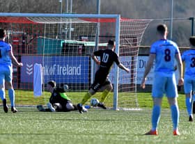 H&W Welders striker Michael McLellan scores the only goal of the game against Institute, at the Ryan McBride Brandywell Stadium.