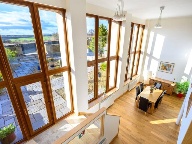 Full height windows run the length of the property.