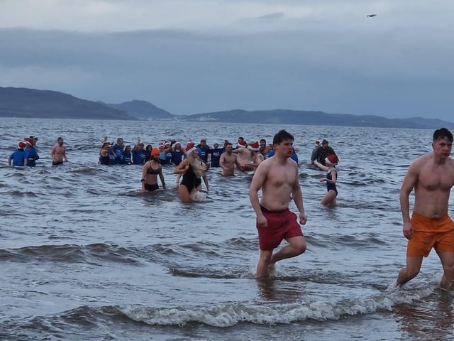 Christmas Day dippers at the annual swim at Ludden beach, Buncrana, County Donegal.